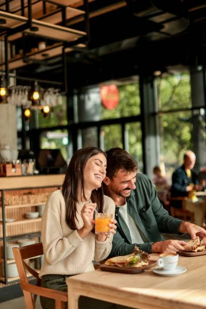 A couple at a bright café